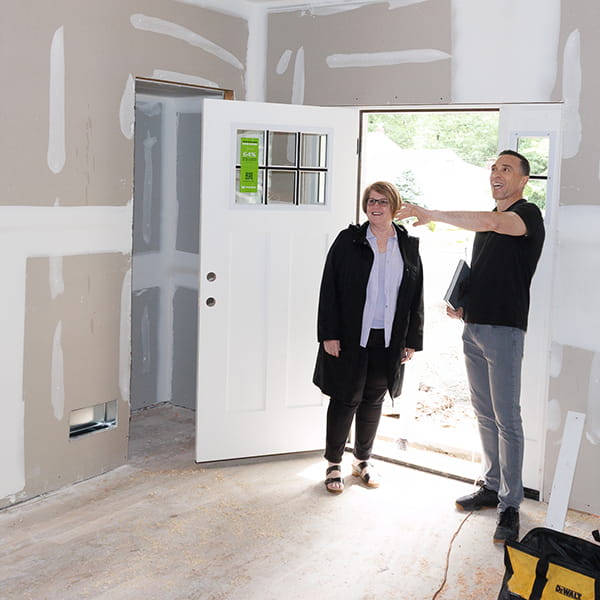 NJ home builder shaking hands with satisfied homeowner