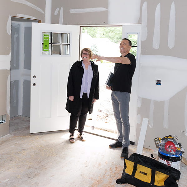 NJ office and retail store builder shaking hands with satisfied business owner